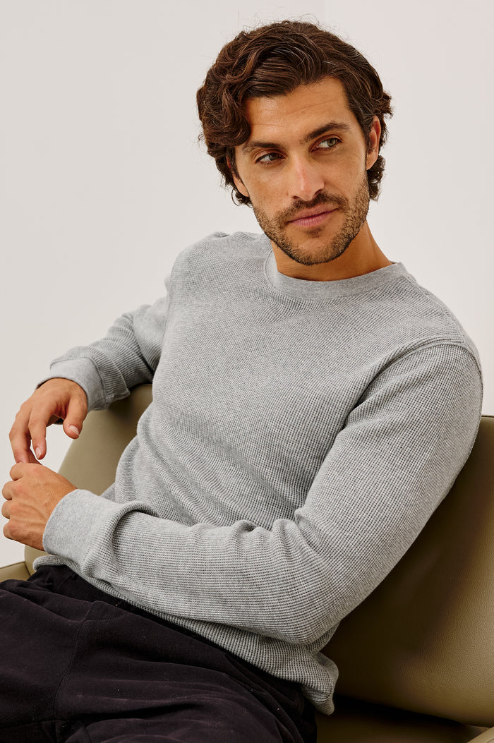 Smith Thermal in Micro-Waflle Cotton Knit With Ribbed Crew Neckline and Cuffs, and Long Sleeves in Heather Grey Colorway - Upper Body View Featured on Model Stylized