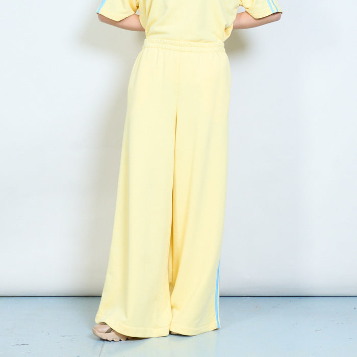 Sporty wide leg jersey trousers with contrast side stripes wholesale