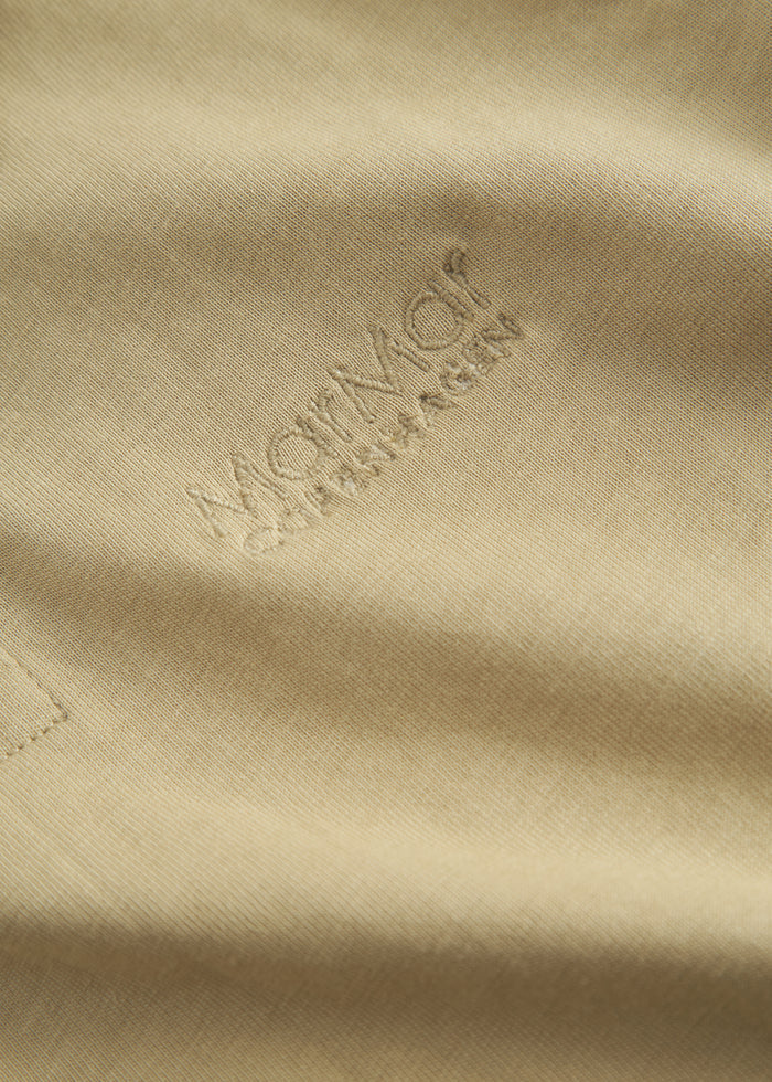 Short beige polo t-shirt for children with collar and button-up