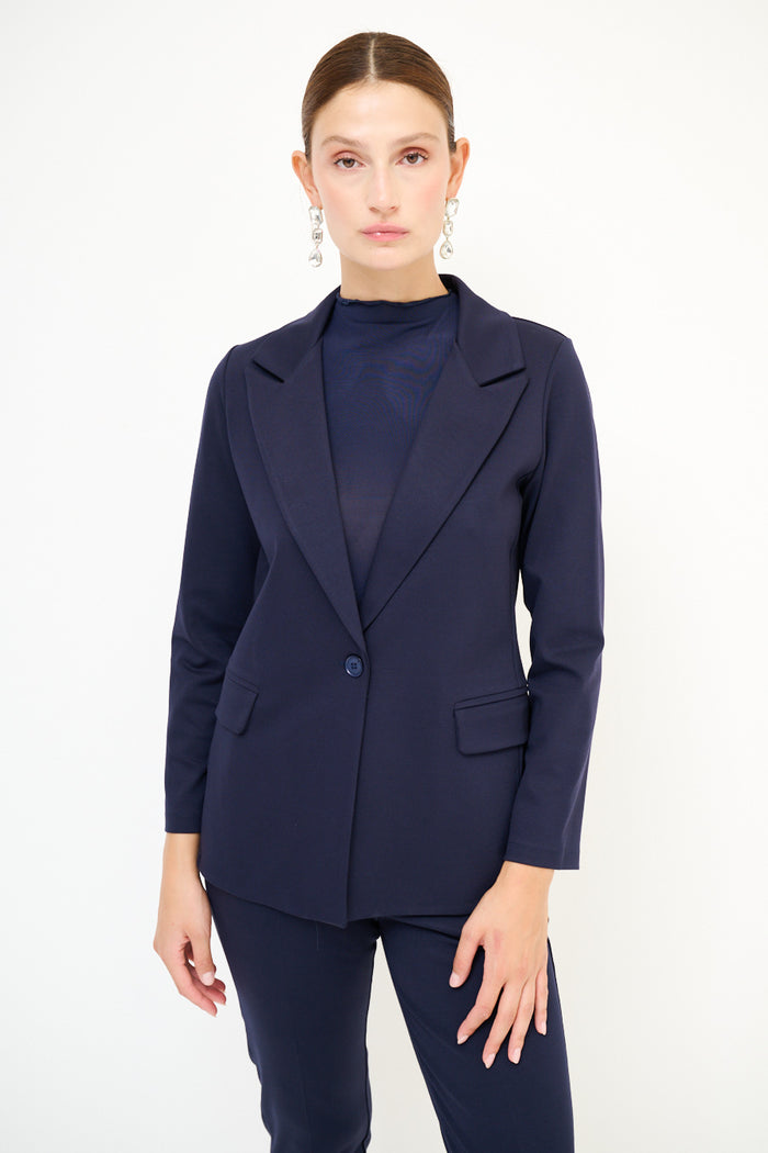 Tailored navy blazer with classic lapels and flap pockets wholesale