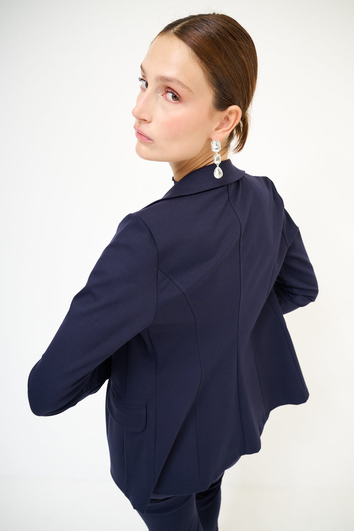 Tailored navy blazer with classic lapels and flap pockets wholesale