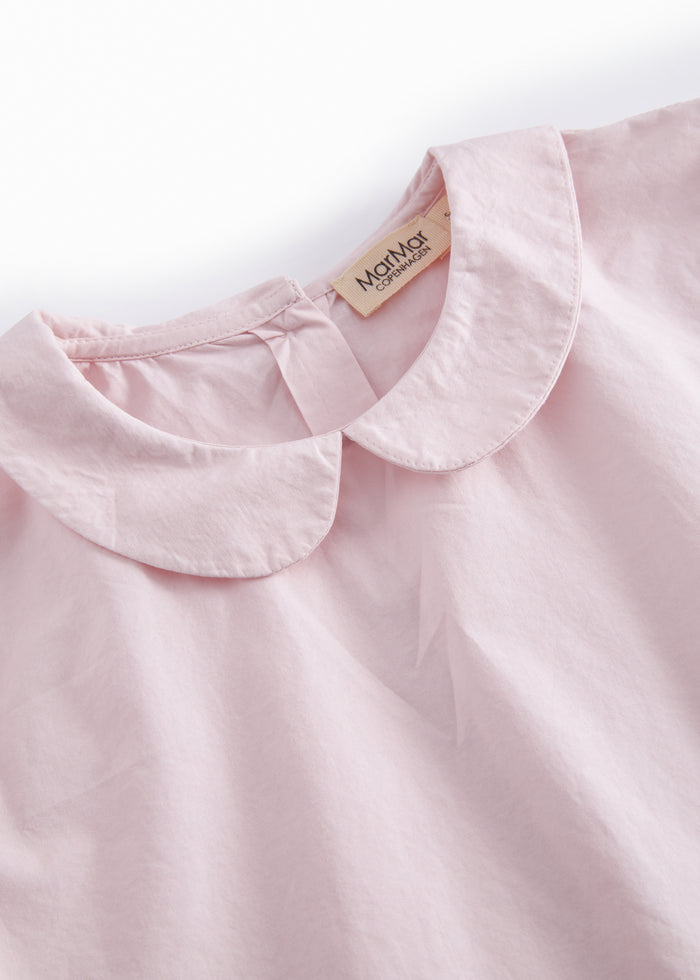 Red children's blouse with collar and long sleeves