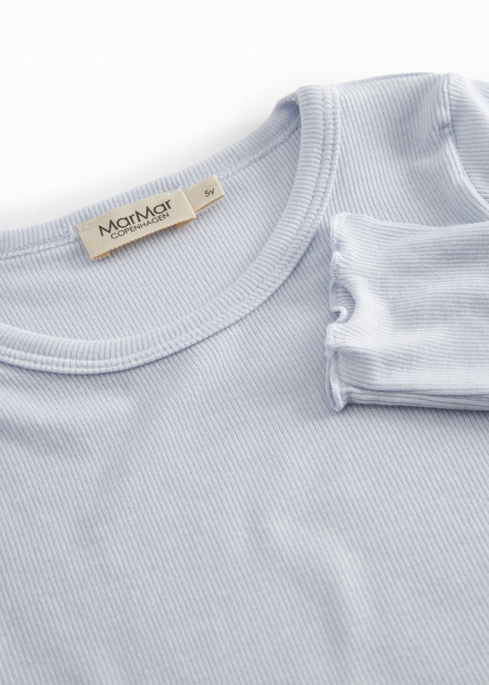 Light blue long-sleeved t-shirt for children with ruffle details.