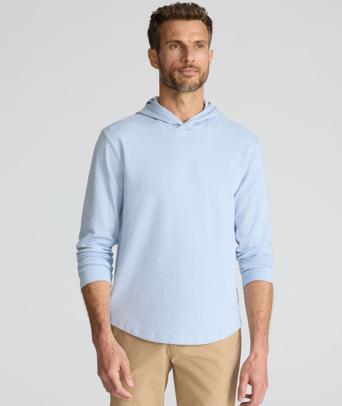 Model is wearing UNTUCKit Textured Knit Hoodie in light blue.