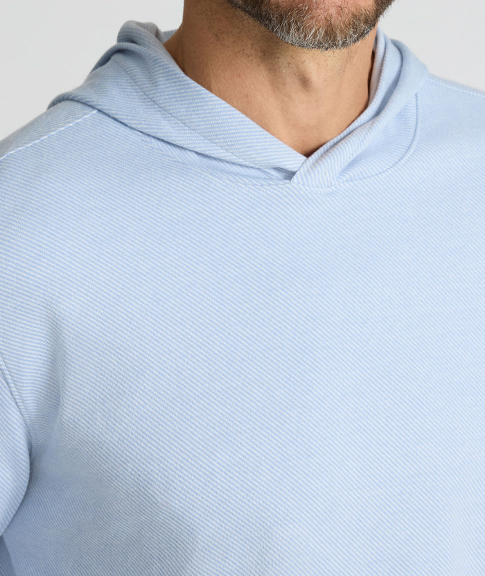 Model is wearing UNTUCKit Textured Knit Hoodie in light blue.