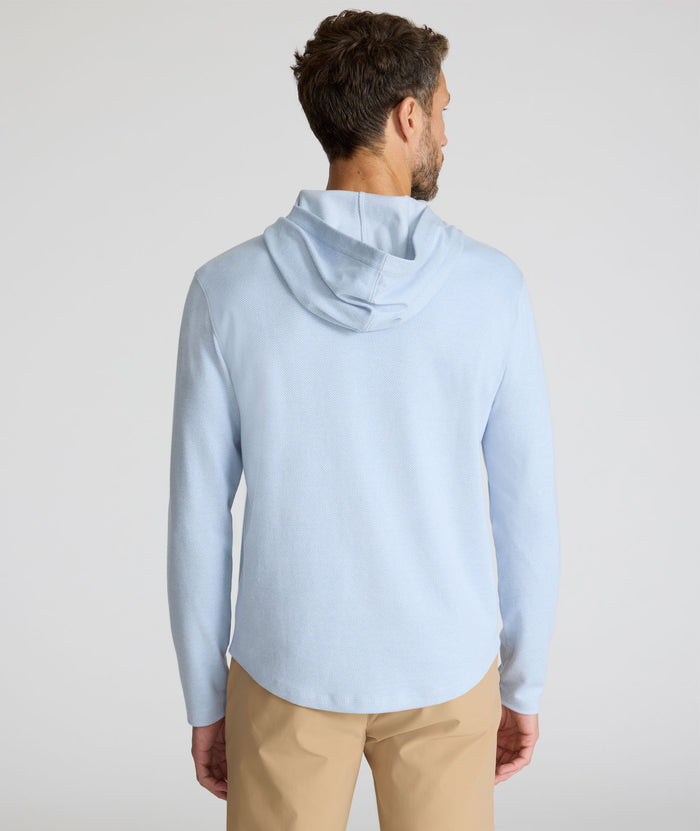 Model is wearing UNTUCKit Textured Knit Hoodie in light blue.