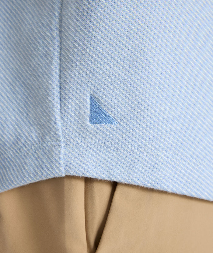 Model is wearing UNTUCKit Textured Knit Hoodie in light blue.