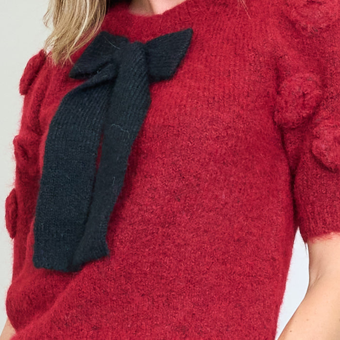 Textured short sleeve fuzzy sweater with oversized knitted bow detail wholesale