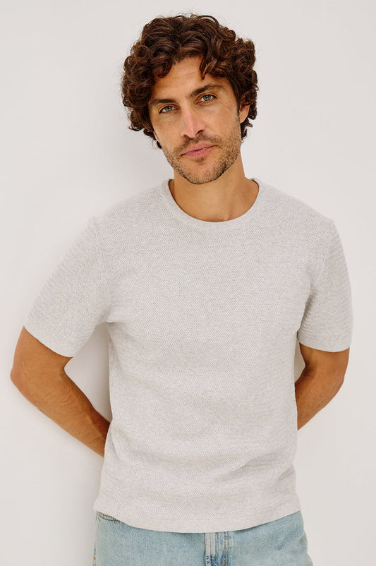 Theo Sweater in Cotton-Cashmere Blend With Short Sleeves, Crew Neckline, and Classic Fit in Heather Grey Colorway - Upper Body Front View Featured on Model