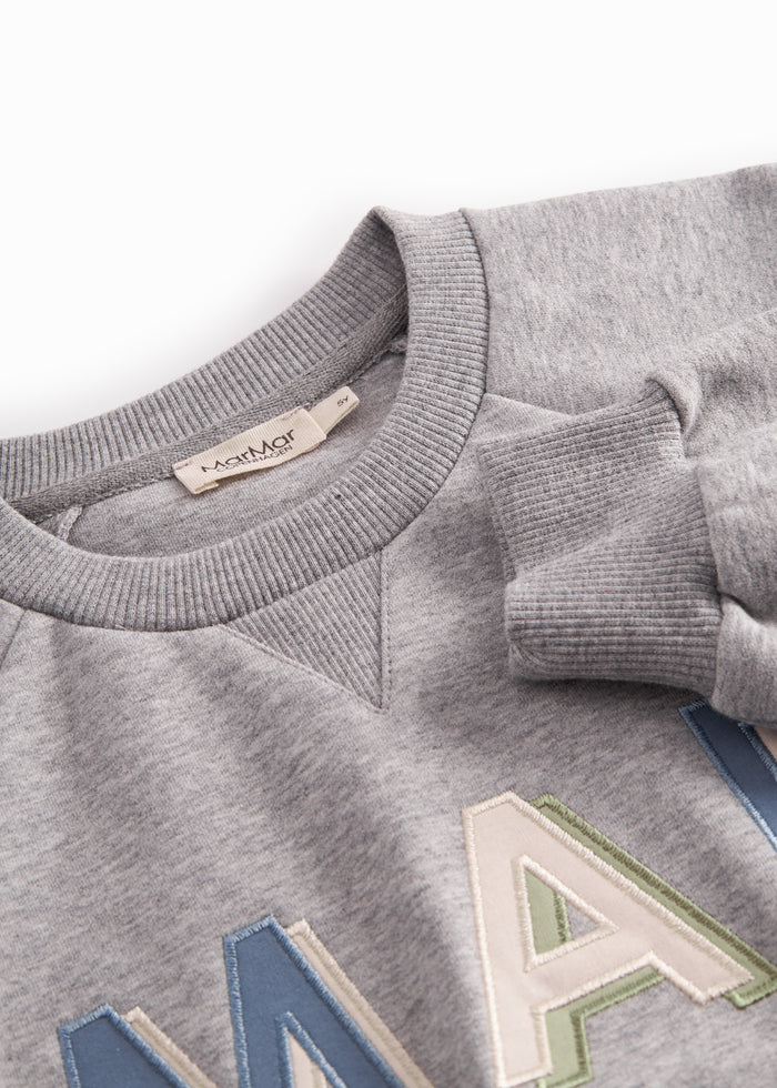 Gray sweatshirt for children with MarMar logo in blue and pink.