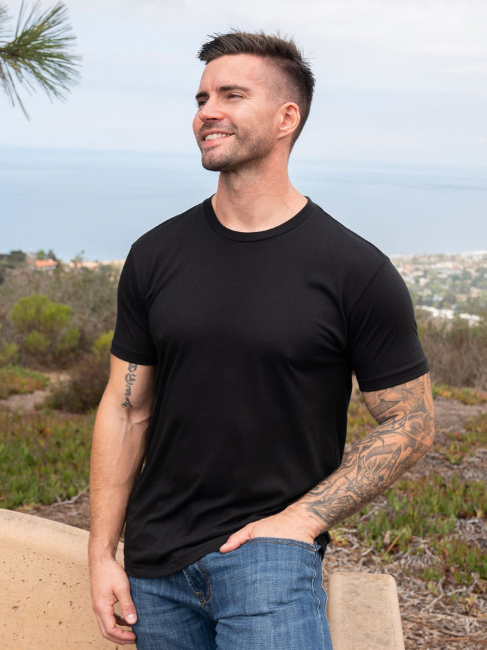 Nolan is 5'10, 190lbs and wears a size M # Throwback 5-Pack Black Crew Tee Model | Fresh Clean Threads