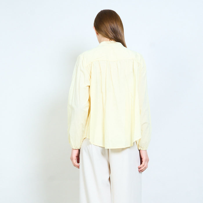Tie neck blouse with softly gathered yoke and relaxed fit wholesale