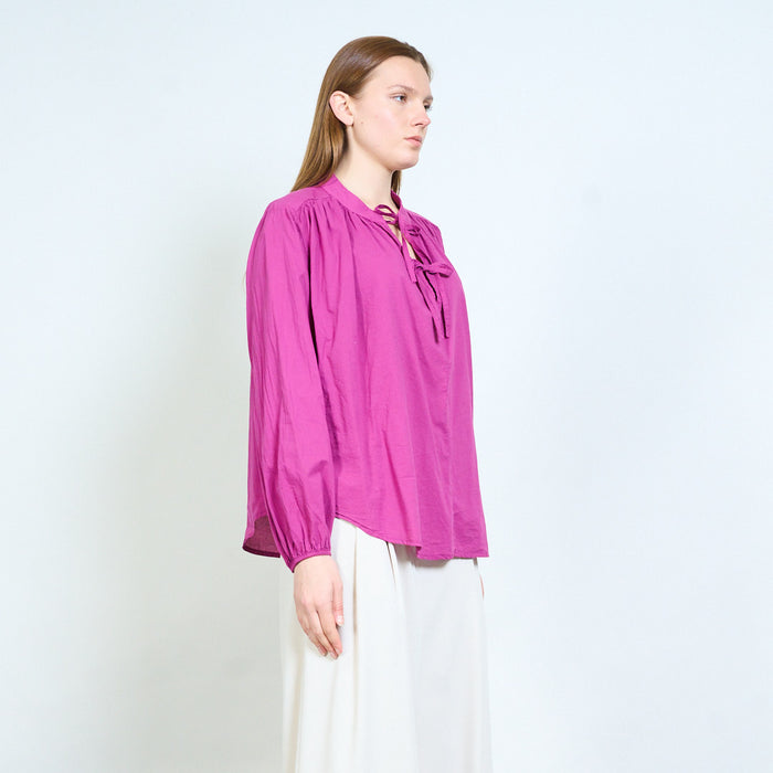 Tie neck blouse with softly gathered yoke and relaxed fit wholesale