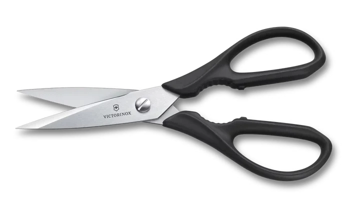 Victorinox scissors with black handles on a white background