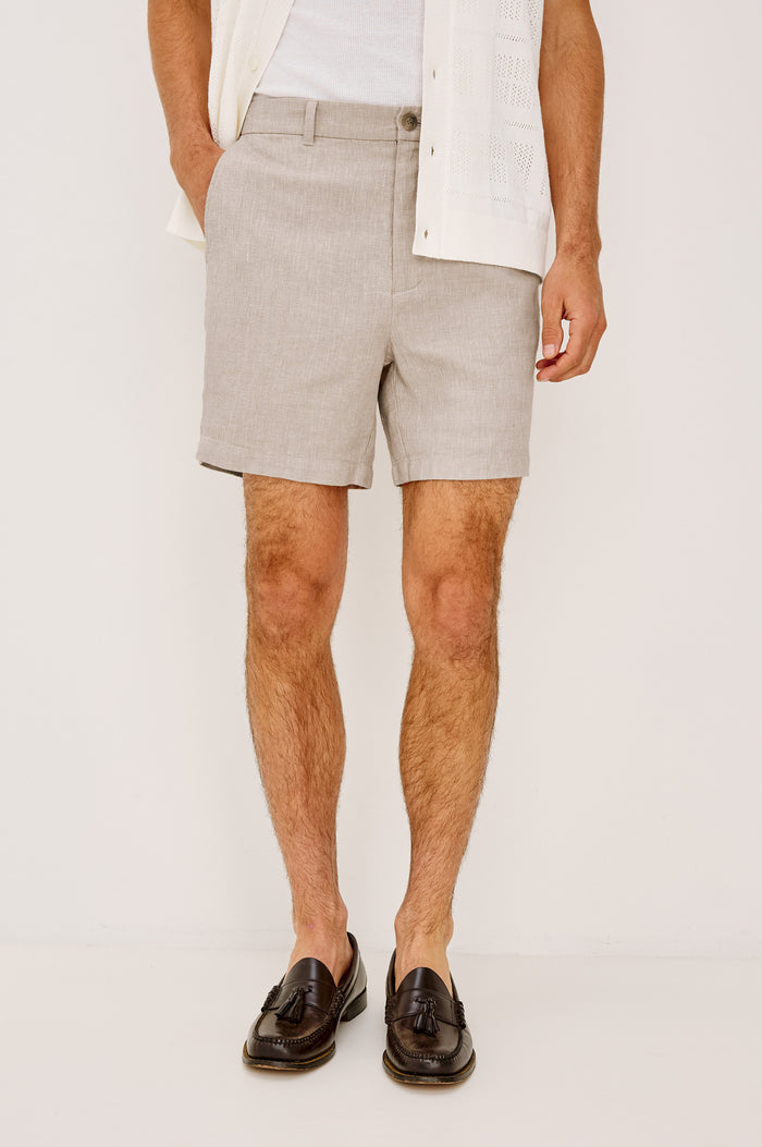 Wilson Short in Linen With a Straight Fit, Clean Front Waistband, Elasticated Back, Front Zip Fly, and Side Pockets in Sand Dune Colorway - Lower Body Front View Featured on Model