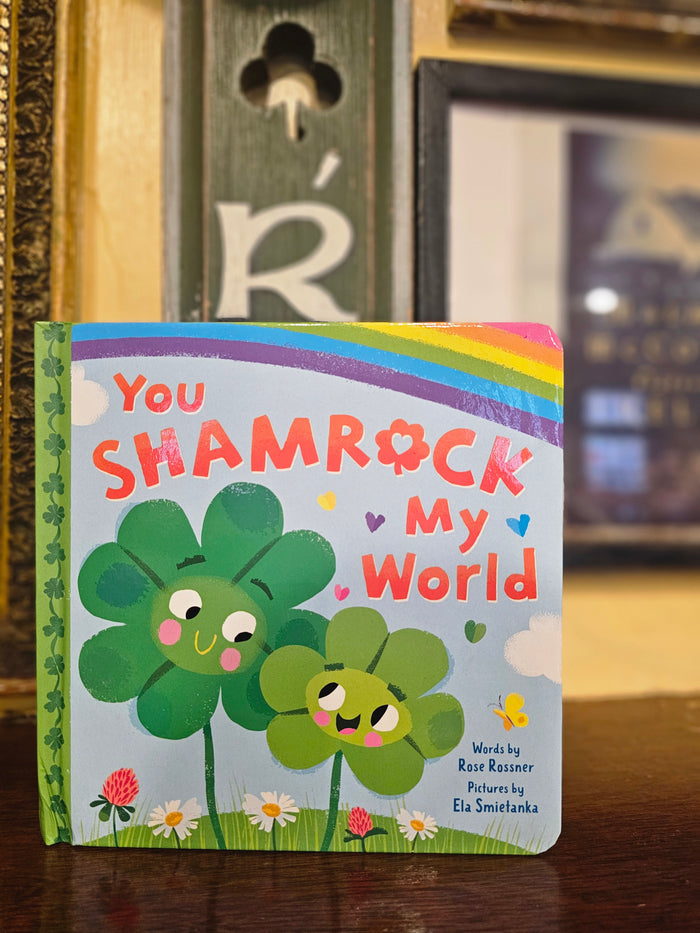 Children's book titled 'You Shamrock My World' with shamrock illustrations